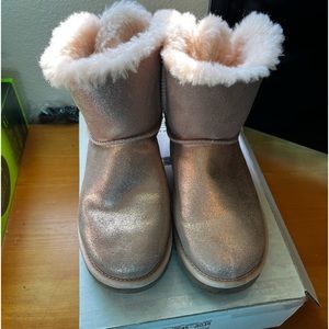 Authentic Ugg boots. Worn once. They are too small for me. Fits like 4 or 4.5.